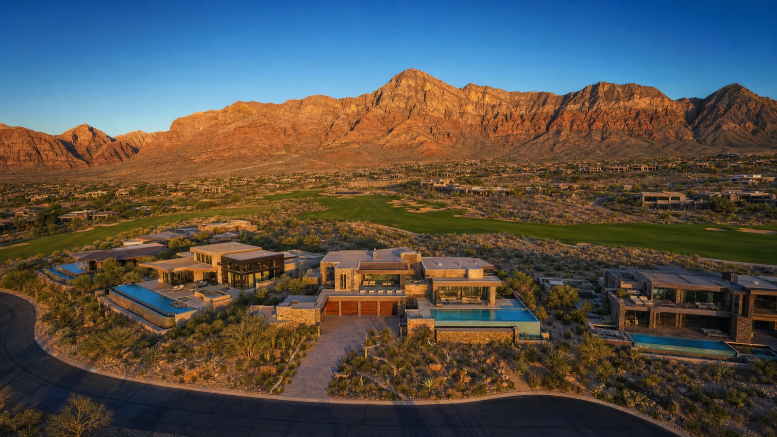 The Summit Club Las Vegas Tiger Woods designed private golf course aerial with custom estates and Red Rock Canyon